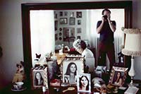 Oda Mae sewing in front room at Eden Avenue